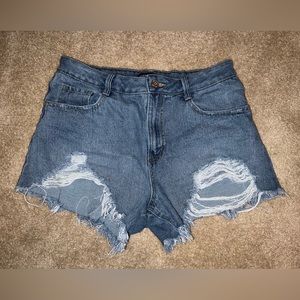 Distressed denim shorts